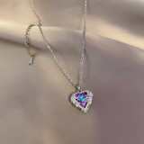 Collar con colgante de diamante artificial con incrustaciones de cobre y acero de titanio en forma de corazón elegante