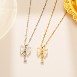 Collar colgante chapado en oro de 18 quilates de acero titanio acrílico con nudo de arco de gotas de agua lindas elegantes a granel