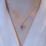 Collar con colgante de diamante artificial con incrustaciones de cobre y acero de titanio en forma de corazón elegante
