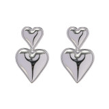 1 par de elegantes pendientes colgantes de acero de titanio con forma de corazón dulce