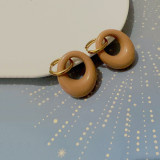 Pendientes colgantes huecos chapados en resina de acero inoxidable circulares a la moda 1 par