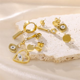 1 Juego de pendientes colgantes chapados en oro de 18K con incrustaciones de acero inoxidable y diamantes de imitación chapados en forma de ojo del diablo de viaje de estilo Simple