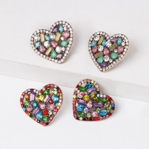 1 par de pendientes con forma de corazón dulce con incrustaciones de aleación y diamantes de imitación
