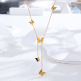 Venta al por mayor, collar de diamantes de imitación chapado en oro de 24K de acero titanio con mariposa en forma de corazón y borla de estilo vintage