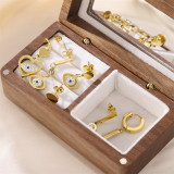 1 Juego de pendientes colgantes chapados en oro de 18K con incrustaciones de acero inoxidable y diamantes de imitación chapados en forma de ojo del diablo de viaje de estilo Simple