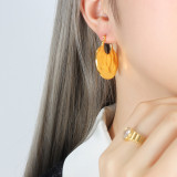 1 par de pendientes de aro chapados en oro de 18 quilates con revestimiento de acero titanio de Color sólido de estilo moderno INS