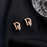 1 par de pendientes elegantes chapados en oro de 18 quilates con incrustaciones de letras de Glam Lady de acero inoxidable