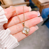 Venta al por mayor dulce estilo Simple estrella flor Shell titanio acero perlas artificiales collar con colgante de circón