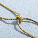 Collar de hueso de serpiente ajustable con colgante de cuentas doradas y acero de titanio a la moda