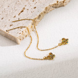 1 par de pendientes colgantes chapados en oro con circonita de acero inoxidable con incrustaciones de mariposa cruzada elegante estilo IG