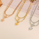Collar chapado en oro de titanio con forma de corazón de estilo simple