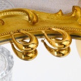 1 par de pendientes de aro chapados en oro de 18 quilates de acero inoxidable chapado en forma de U de estilo simple informal