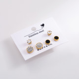 1 Juego de pendientes elegantes de acero inoxidable con llave de mariposa y cara sonriente para mujer