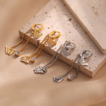 1 par de pendientes de gota chapados en oro de 18K con incrustaciones huecas de mariposa de viaje de estilo Simple con incrustaciones de acero de titanio y circonita