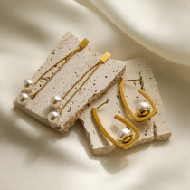 1 par de pendientes chapados en oro de 18K con perlas artificiales de acero y titanio con incrustaciones geométricas de viaje de estilo Simple