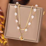 Collares en capas con revestimiento de perlas y palanca de acero titanio y mariposa elegante informal