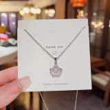 Collar con colgante de diamantes de imitación con incrustaciones de acero titanio y corona en forma de corazón y estrella a la moda