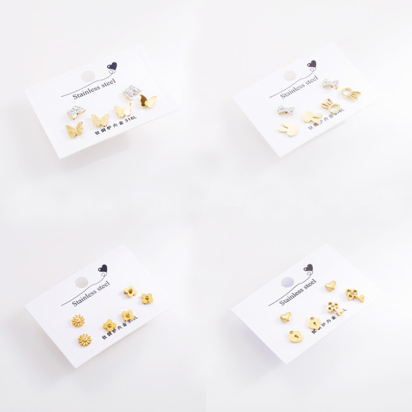 1 Juego de pendientes elegantes de acero inoxidable con llave de mariposa y cara sonriente para mujer