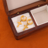 1 par de pendientes chapados en oro de 18 quilates de acero inoxidable con cruz redonda de estilo simple