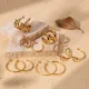 Pendientes giratorios brillantes de bambú en forma de C de acero inoxidable con personalidad de lujo y simplicidad ligeros de acero de titanio