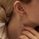 1 par de aretes de acero inoxidable con revestimiento giratorio de estilo simple