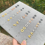 Pendientes con revestimiento de acero y titanio para árbol de Navidad, 1 par