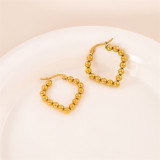 1 par de pendientes chapados en oro de 18 quilates de acero inoxidable con revestimiento redondo irregular de estilo simple