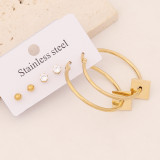 1 Juego de pendientes chapados en oro de acero inoxidable con forma de corazón y estrella de viaje