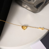 Estilo IG Letra de estilo simple Llave en forma de corazón Chapado en acero de titanio Ahueca hacia fuera Collar chapado en oro de 18 quilates