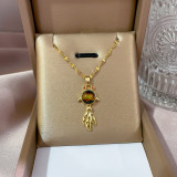 Collar con colgante de diamantes de imitación con incrustaciones de cobre y acero titanio con forma de corazón de oso de estilo simple