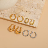 1 par de elegantes pendientes chapados en oro de 14 quilates con forma de C y forma de U con incrustaciones de revestimiento asimétrico y circonita de acero de titanio