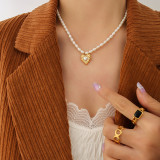 Collar chapado en oro real de 18 quilates con perlas de agua dulce y corazón batido de estilo retro europeo y americano