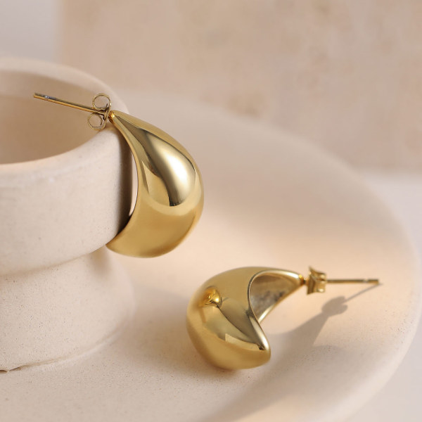 1 par de pendientes chapados en acero de titanio Lady Pea
