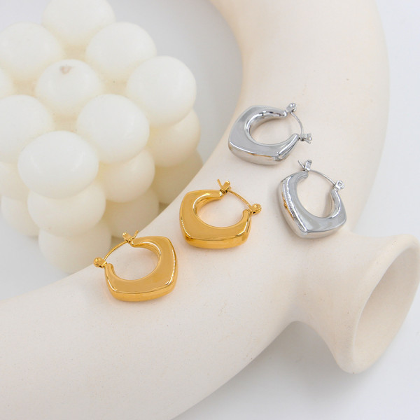 1 par de aretes de aro chapados en acero inoxidable redondos de estilo simple