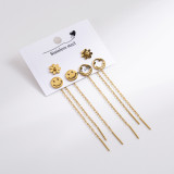 1 Juego de pendientes elegantes de acero inoxidable con llave de mariposa y cara sonriente para mujer