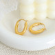 1 par de pendientes chapados en oro de 18 quilates de acero de titanio con revestimiento de color sólido de estilo simple