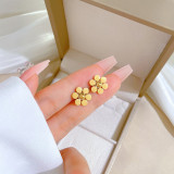 1 par de pendientes de acero de titanio con flor dulce