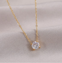 Collar con colgante chapado en oro con diamantes de imitación y incrustaciones de acero de titanio redondo a la moda