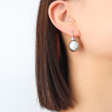 Joyería de oreja de acero de titanio con perla geométrica simple
