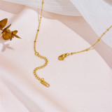 Collar colgante chapado en oro de acero titanio con mariposa cruzada de estilo simple a granel
