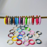1 par de aretes de acero inoxidable esmaltados con bloques de color de estilo simple