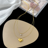 Collares en capas chapados en oro de 18 quilates con incrustaciones de acero de titanio con forma de corazón estilo IG