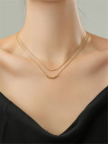 Collar chapado en oro de 14 quilates con borlas de cobre y acero de titanio de color sólido de estilo simple
