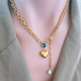 Collar de circón de perlas artificiales con incrustaciones de acero titanio en forma de corazón con gotas de agua a la moda