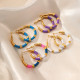 Pendientes de aro chapados en oro de acero inoxidable con forma de C a la moda, 1 par