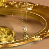 Collar colgante de Zircon chapado en oro de acero titanio con forma de corazón de estilo simple a granel