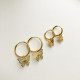 1 par de aretes de acero de titanio con mariposa de estilo simple