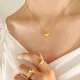 Collar con colgante chapado en oro de 18 quilates con revestimiento de acero de titanio en forma de corazón de estilo Simple INS