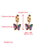 1 par de elegantes pendientes colgantes chapados en oro con diamantes de imitación de acero y titanio con incrustaciones de mariposa y ojo de pentagrama para mujer