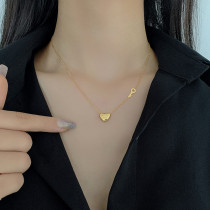 Estilo IG Letra de estilo simple Llave en forma de corazón Chapado en acero de titanio Ahueca hacia fuera Collar chapado en oro de 18 quilates